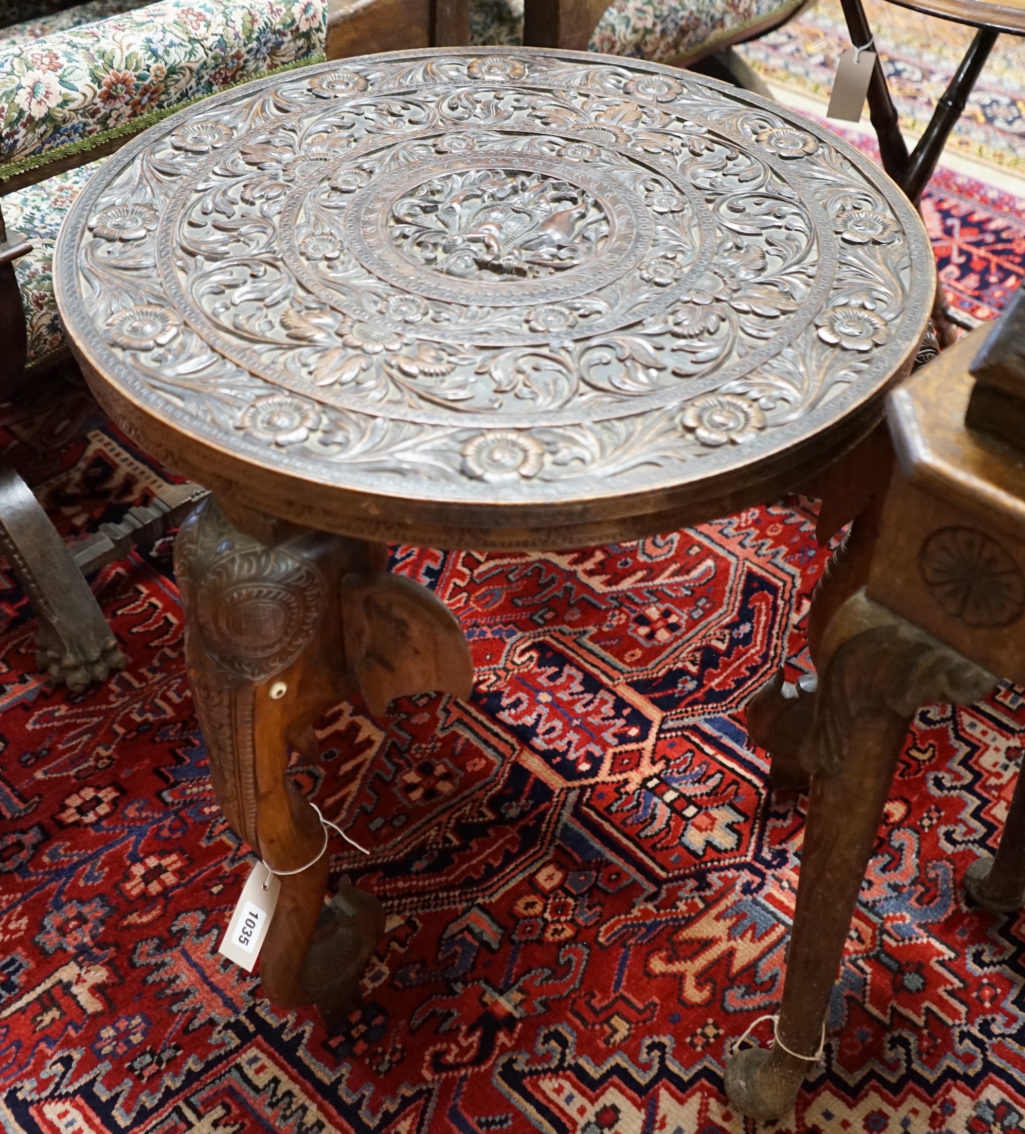 An Indian circular carved hardwood occasional table, diameter 60cm, height 63cm
